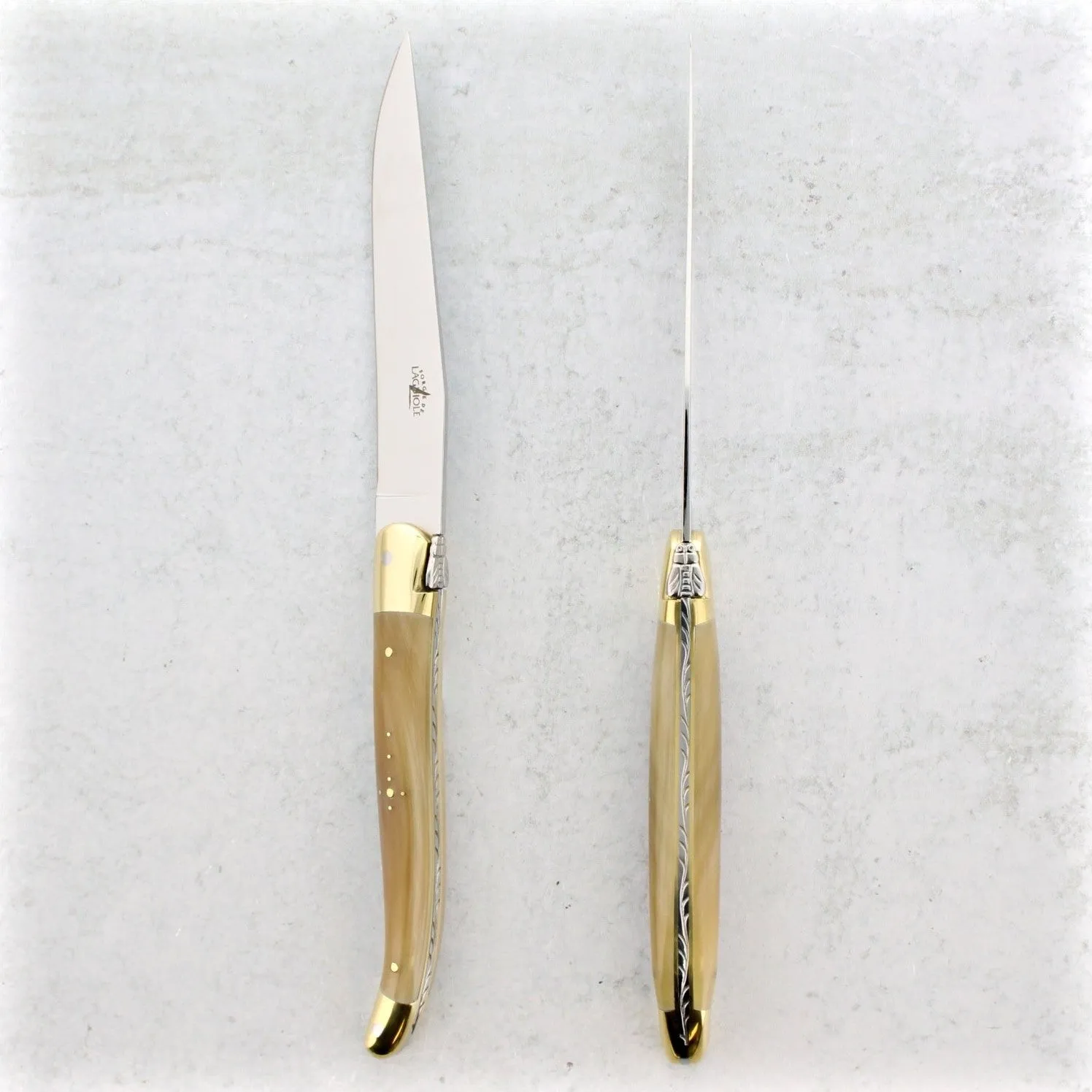 Forge de Laguiole Horn Tip Handle Steak Knives - Brass Bolsters - Set of 2